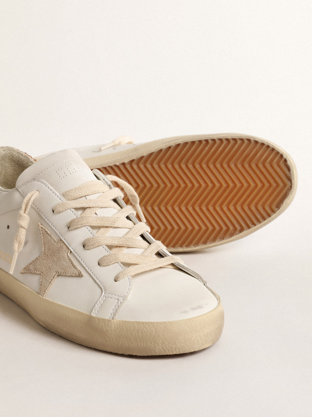 Super-Star with a suede star and peach-pink glitter heel tab| Golden Goose