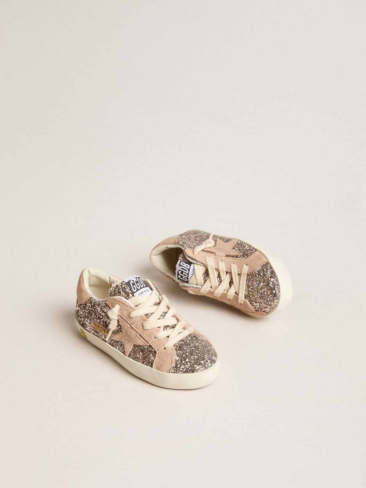 Young Super-Star in glitter with suede star and heel tab| Golden Goose