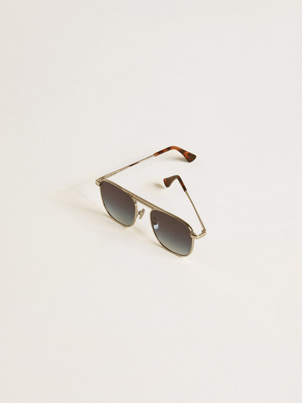 Aviator style sunglasses with silver frame and blue lenses| Golden Goose