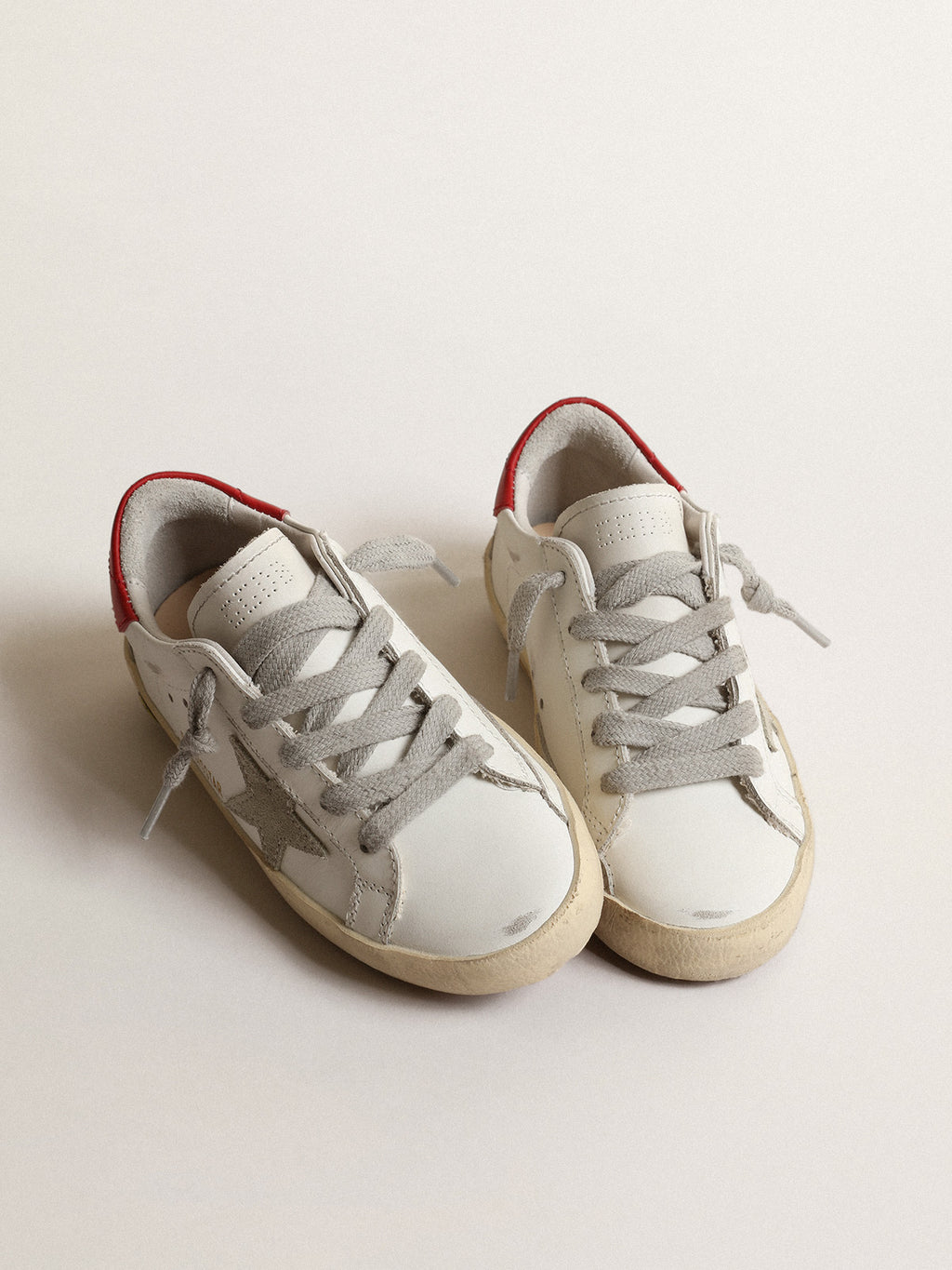 Super-Star Young with suede star and red leather heel tab| Golden Goose