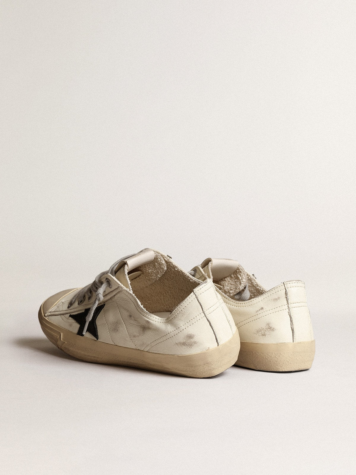 V-Star sneakers in off-white nappa leather with black nubuck star| Golden Goose
