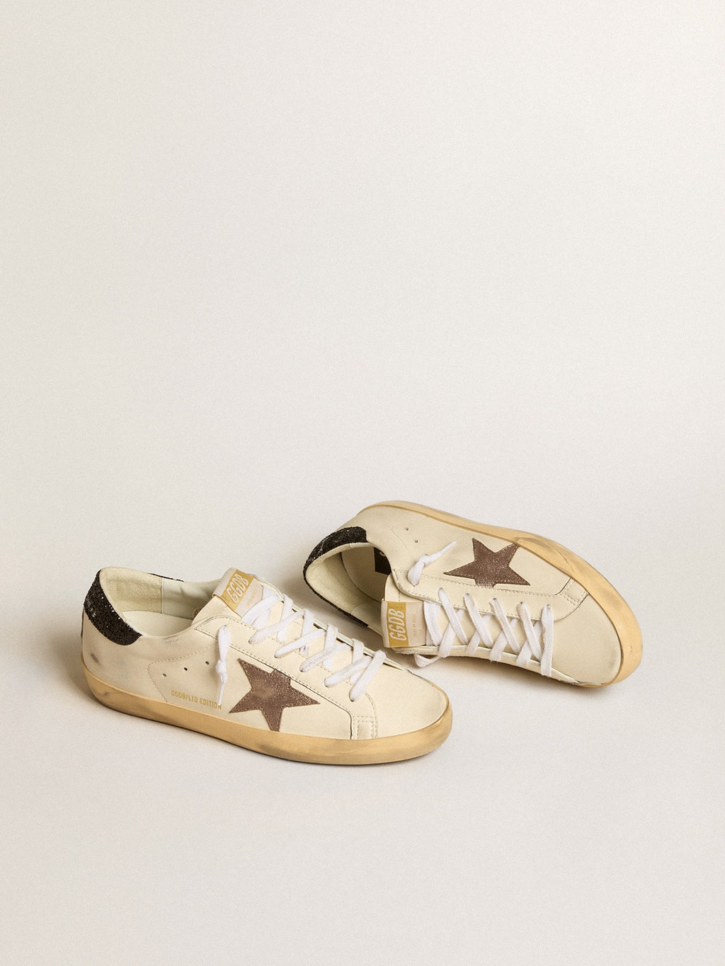 Super-Star LTD with laminated leather star and black glitter heel tab| Golden Goose