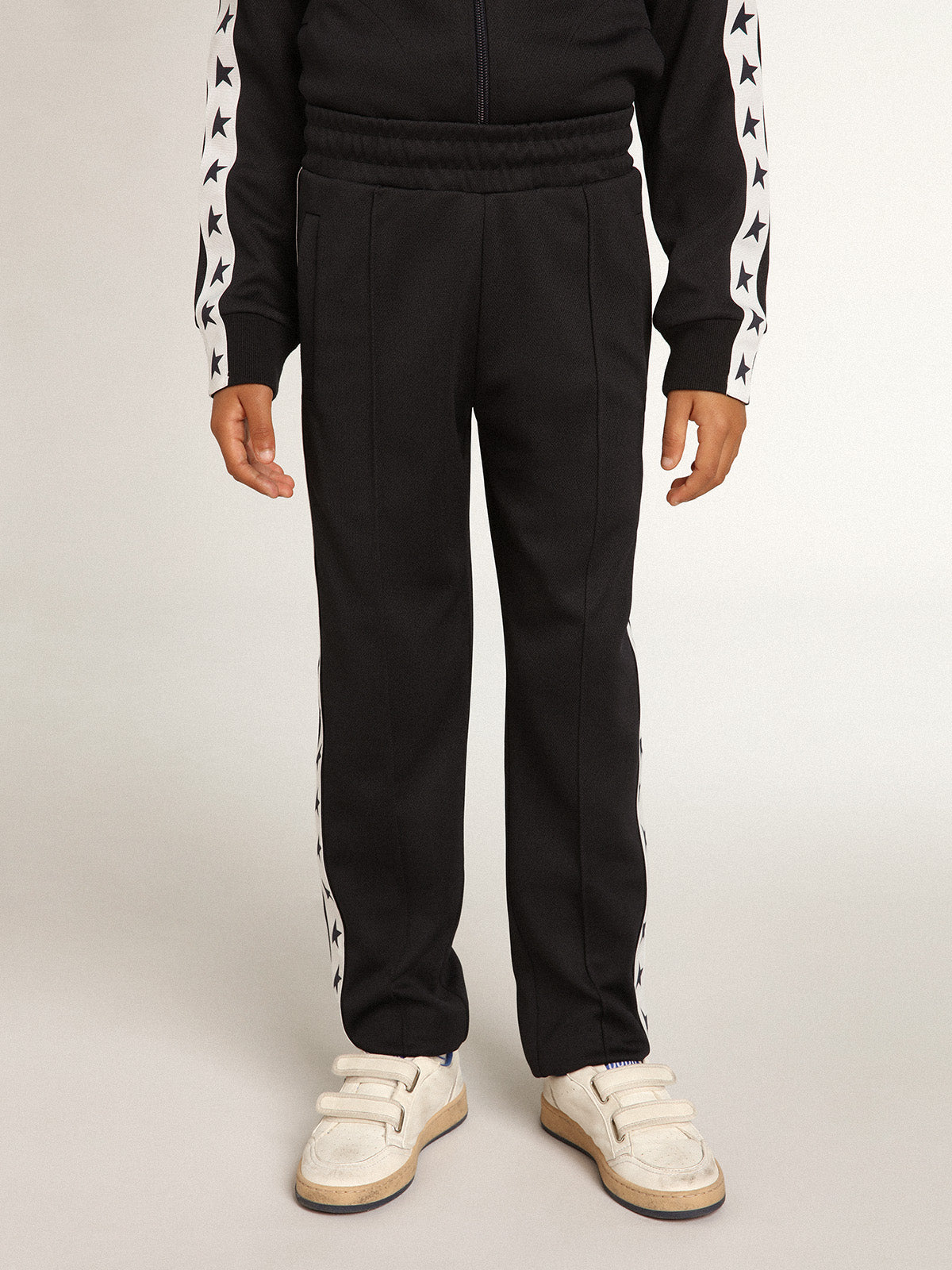 Dark blue joggers with white strip and contrasting stars| Golden Goose
