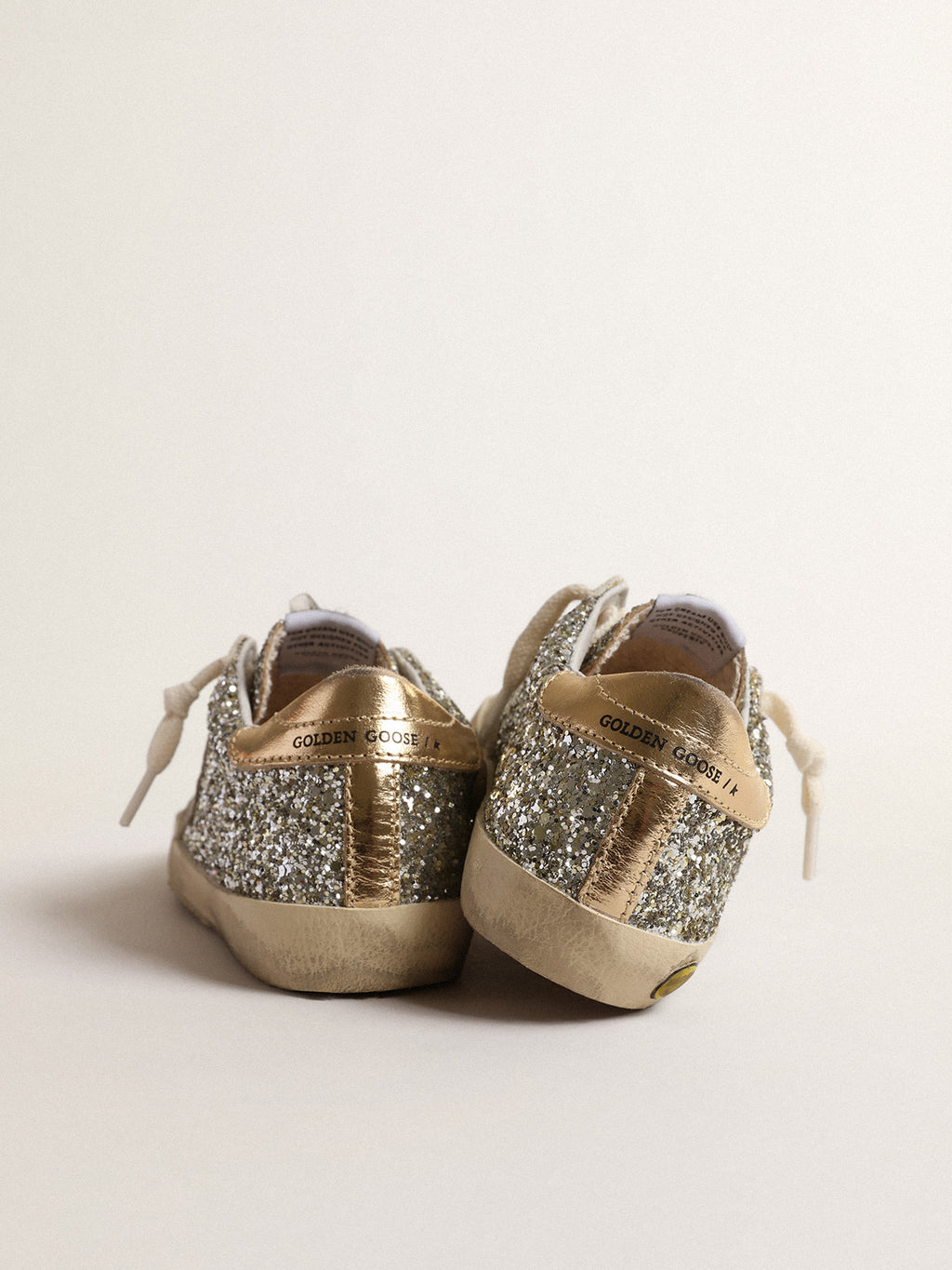 Super-Star Junior in glitter with a suede star and gold heel tab| Golden Goose