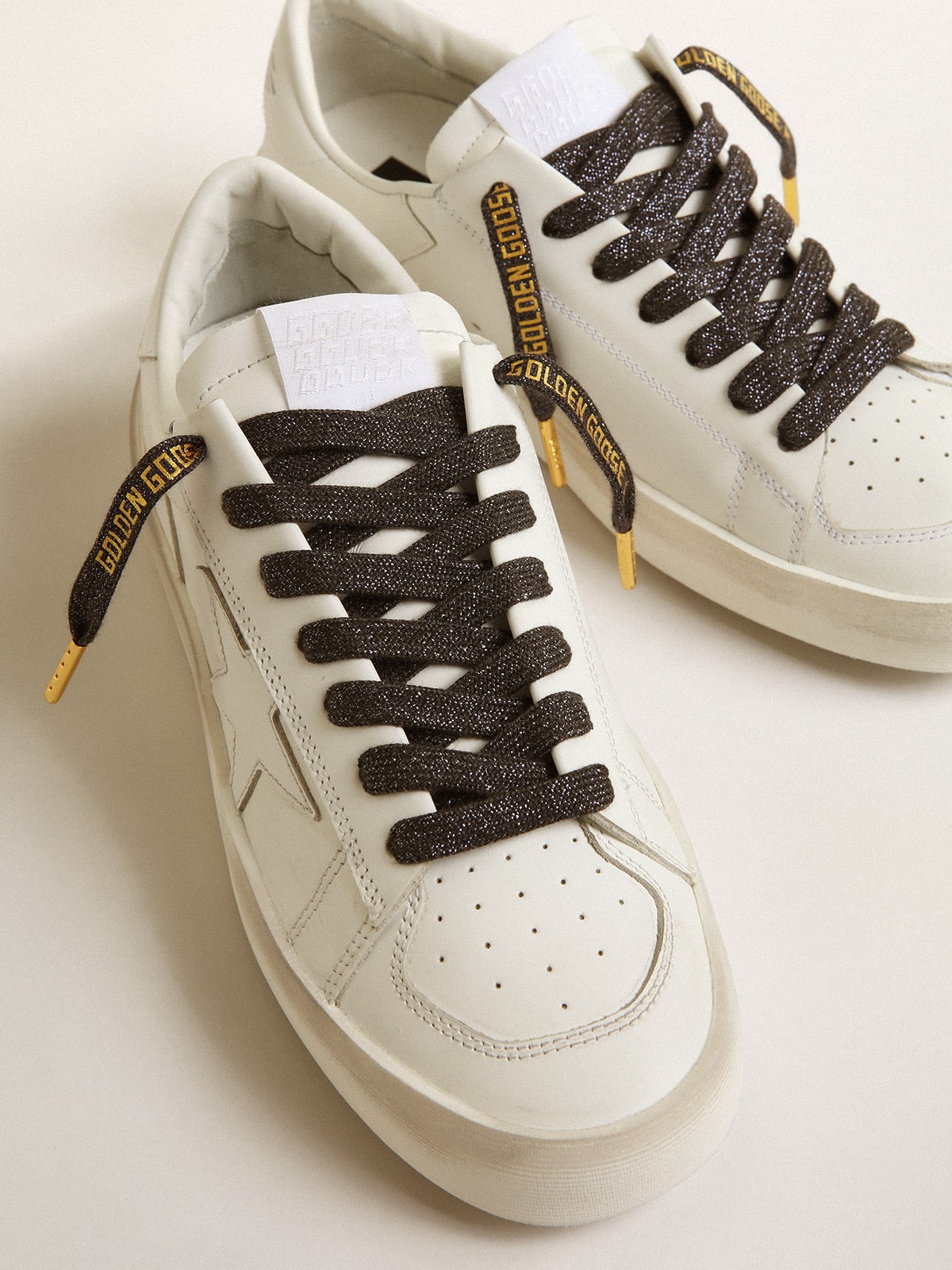 Dark gray lurex laces with contrasting gold logo| Golden Goose