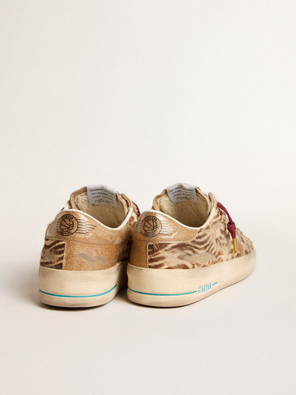 Women's Stardan LTD in animal-print pony skin with gold glitter star| Golden Goose