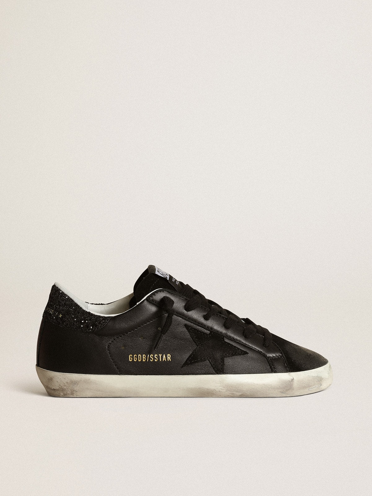 Women's Super-Star in black nappa with black star and glitter heel tab| Golden Goose