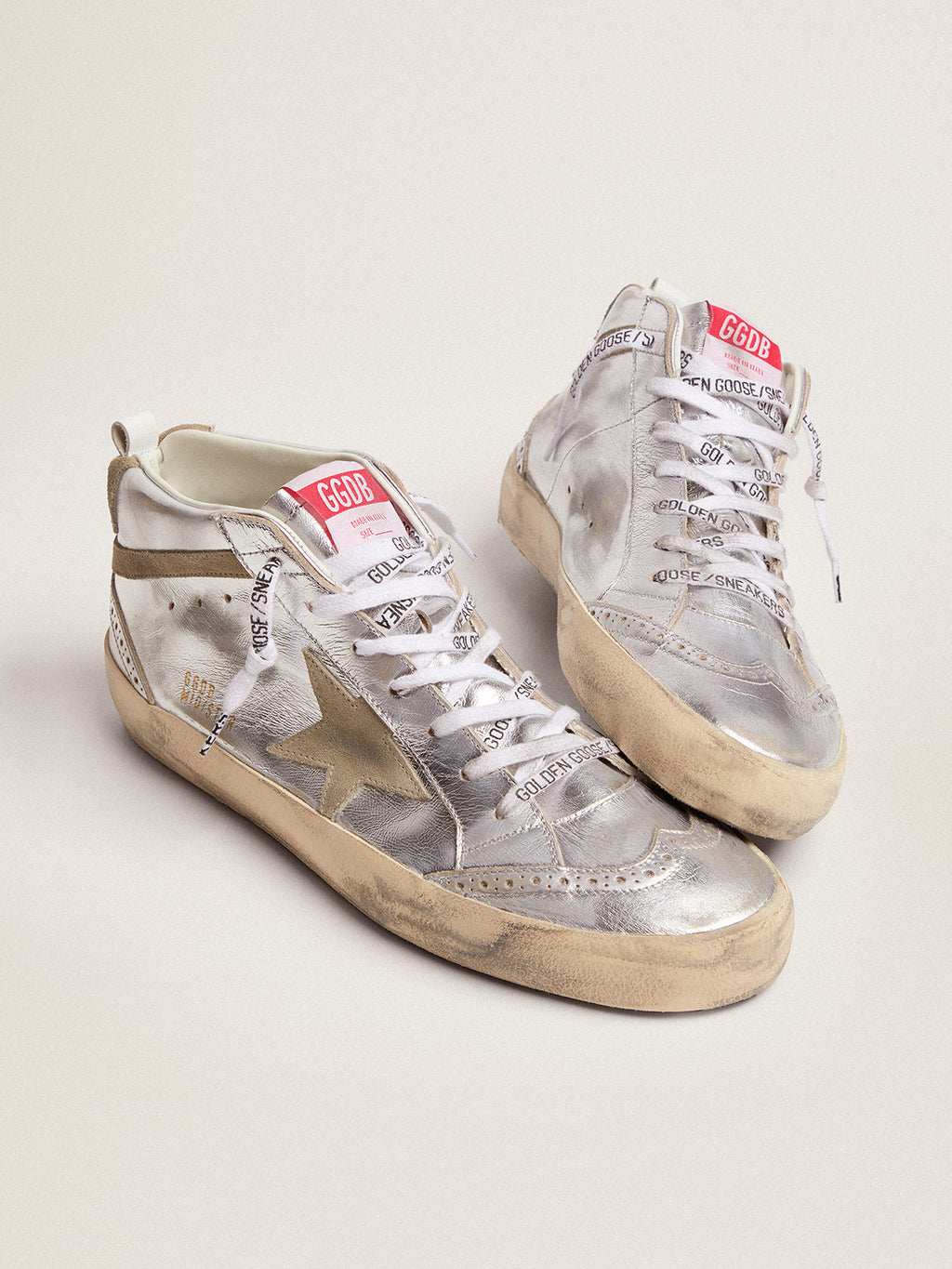 Women's Mid Star in silver laminated leather with dove gray star| Golden Goose
