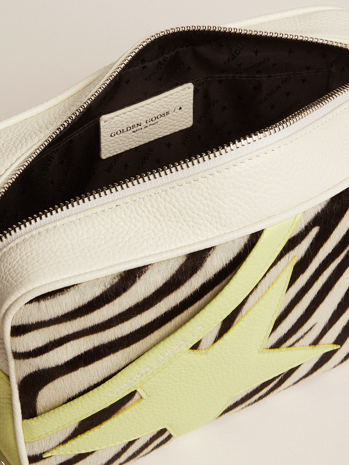 Star Bag in white and lime hammered leather with zebra-print pony skin insert and lime-colored leather star| Golden Goose