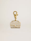 Purse-shaped charm in gold-colored brass with crystals| Golden Goose