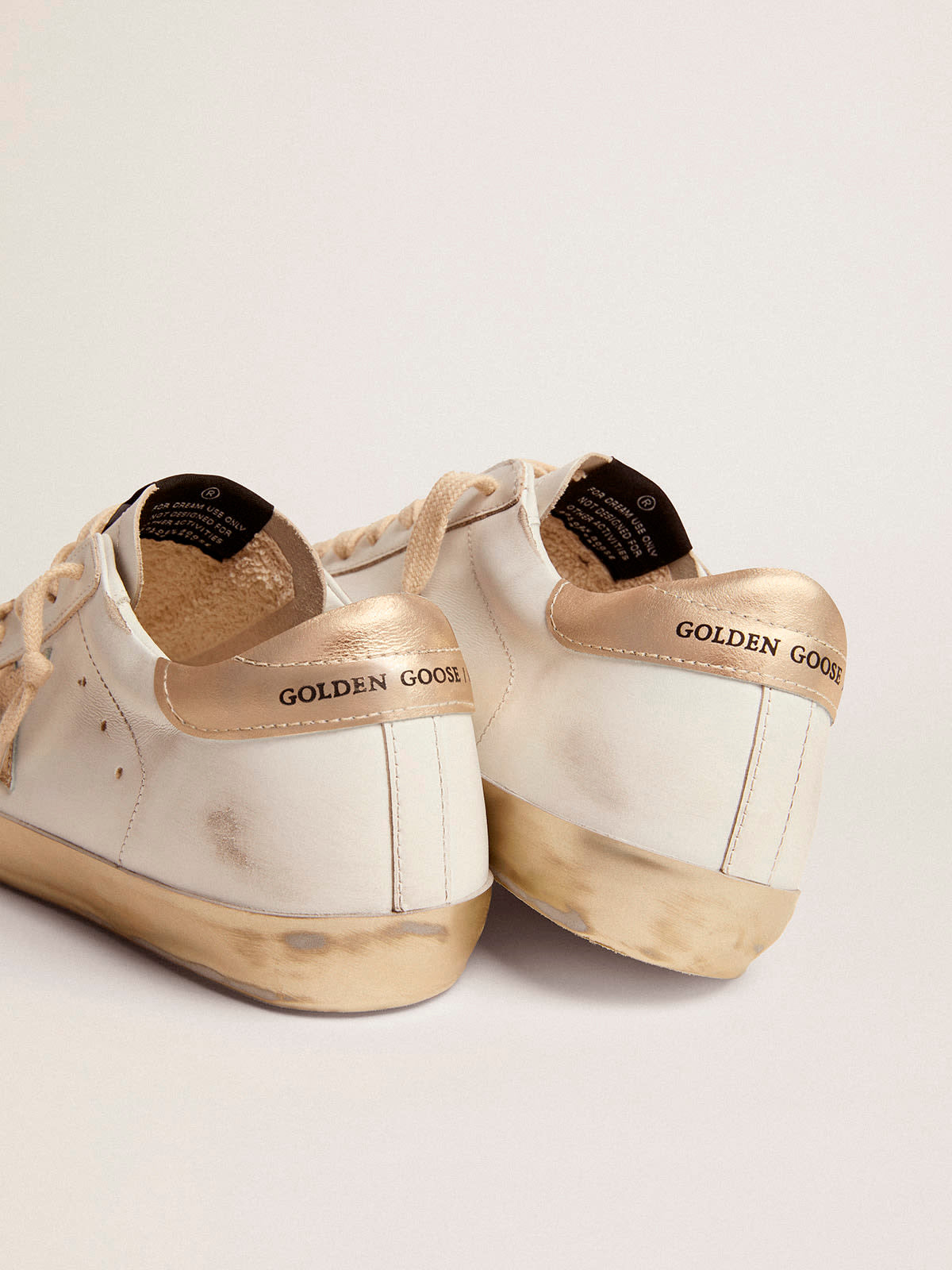 Women's Super-Star sneakers with gold foxing| Golden Goose