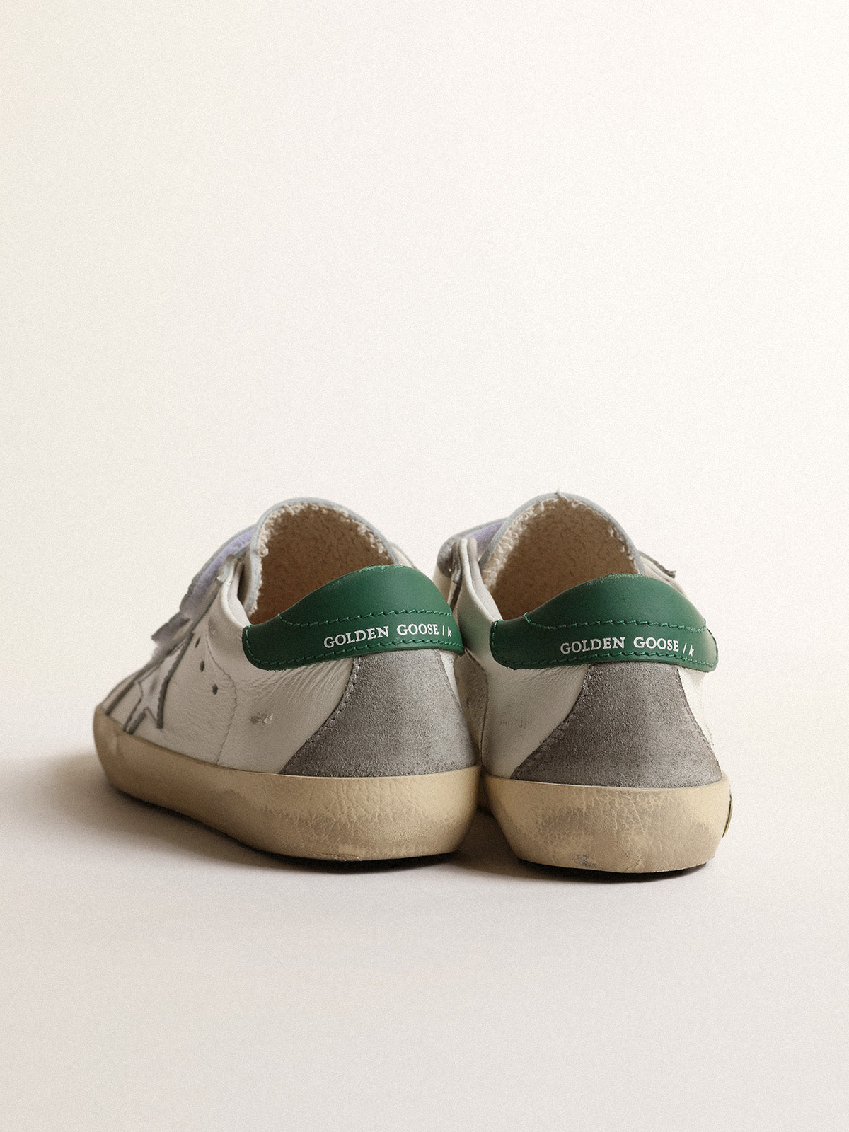 Old School Junior with metallic leather star and green heel tab| Golden Goose