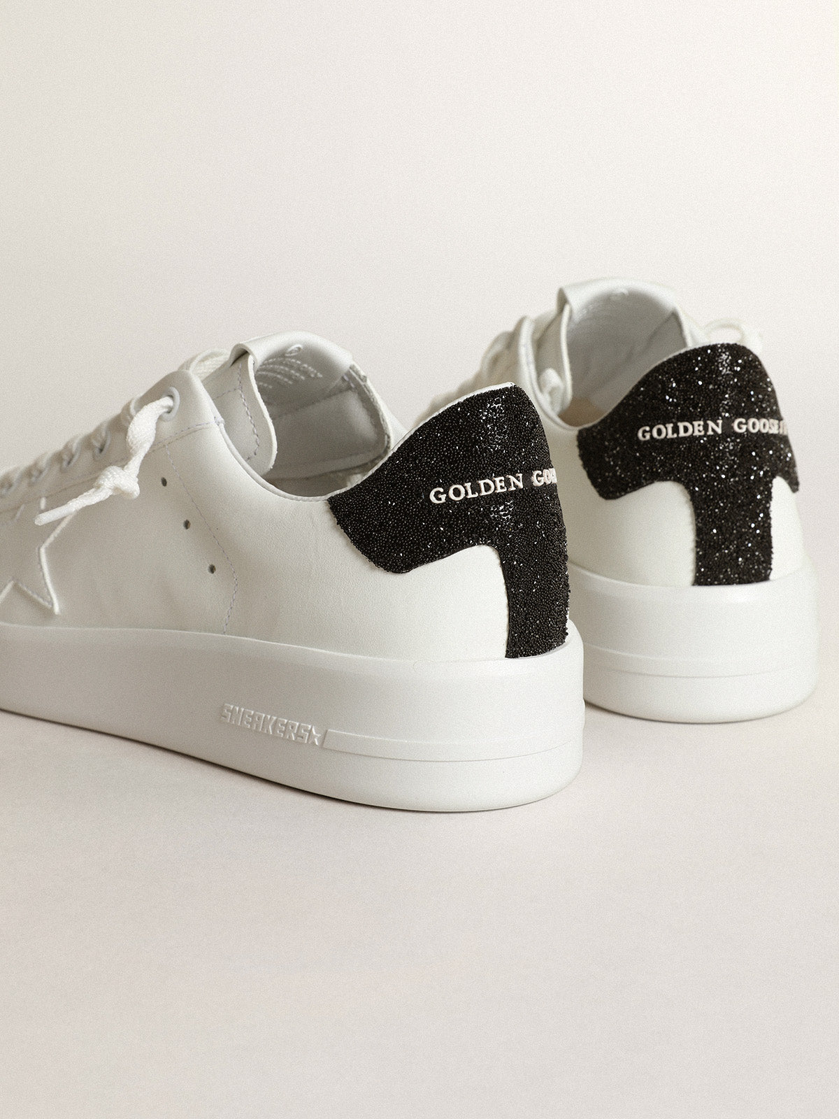 Purestar sneakers in white leather with tone-on-tone star and heel tab in black Swarovski crystals| Golden Goose