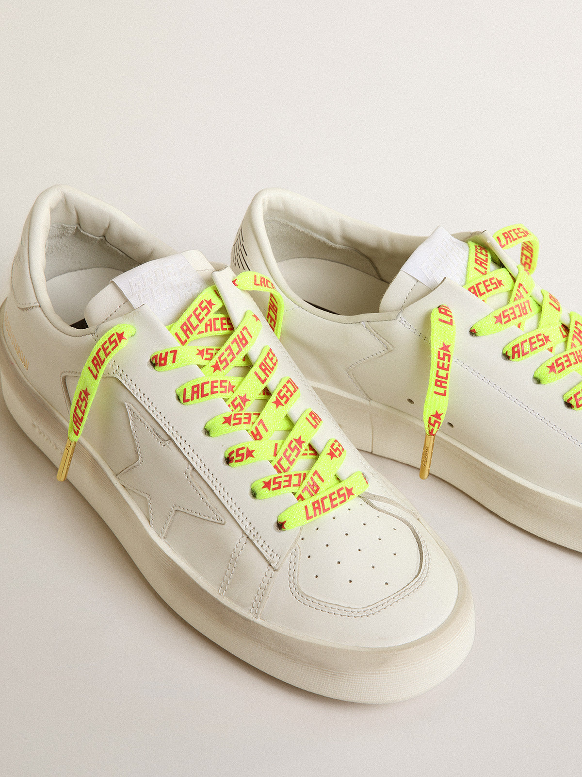 Fluorescent yellow laces with contrasting orange 'Laces' lettering| Golden Goose