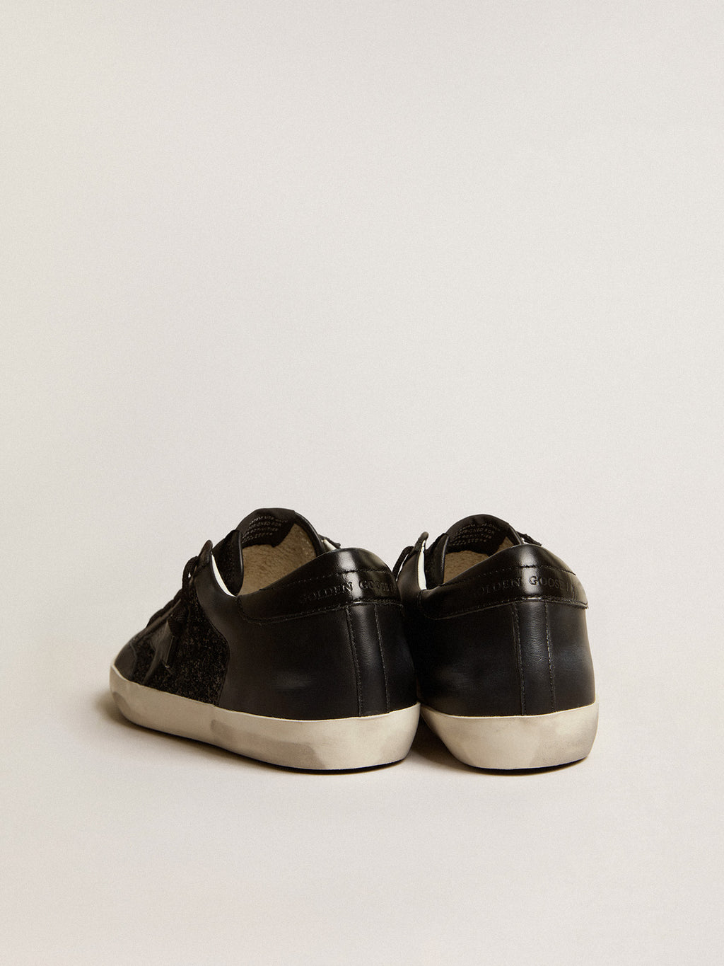 Super-Star in black nappa and glitter with glossy black leather star| Golden Goose