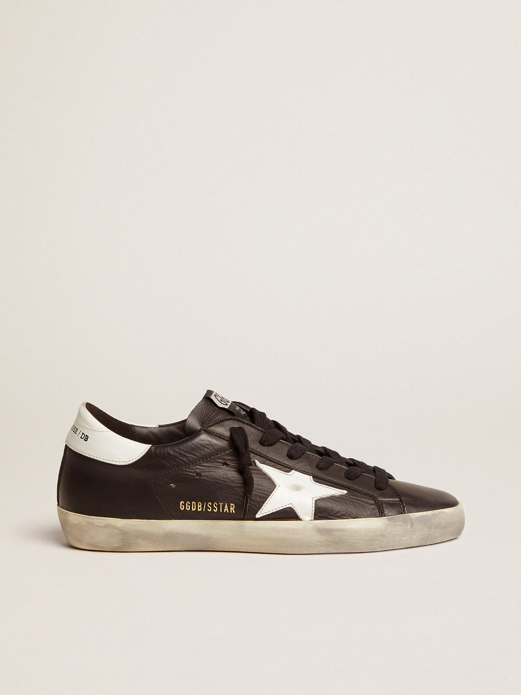 Women's Super-Star in black leather with white leather star and heel tab| Golden Goose