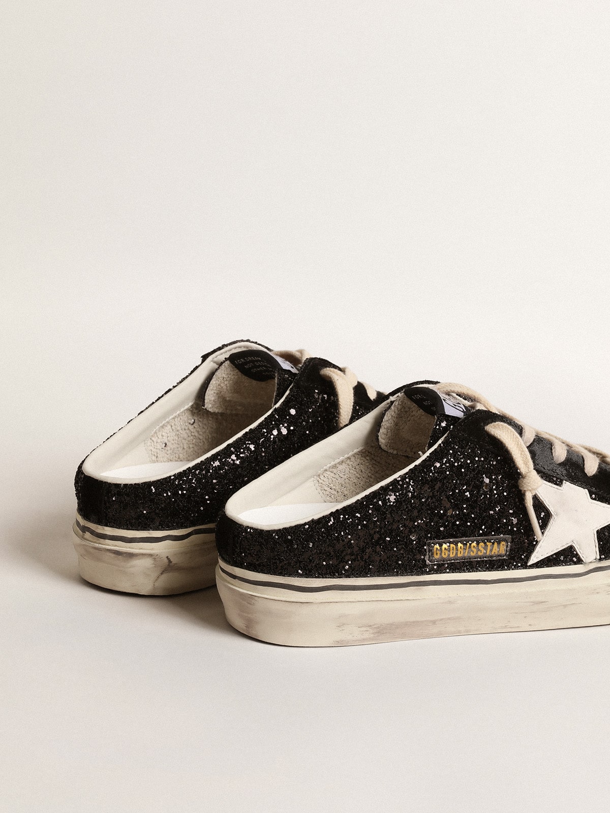 Super-Star Sabots in black glitter with white bio-based star| Golden Goose