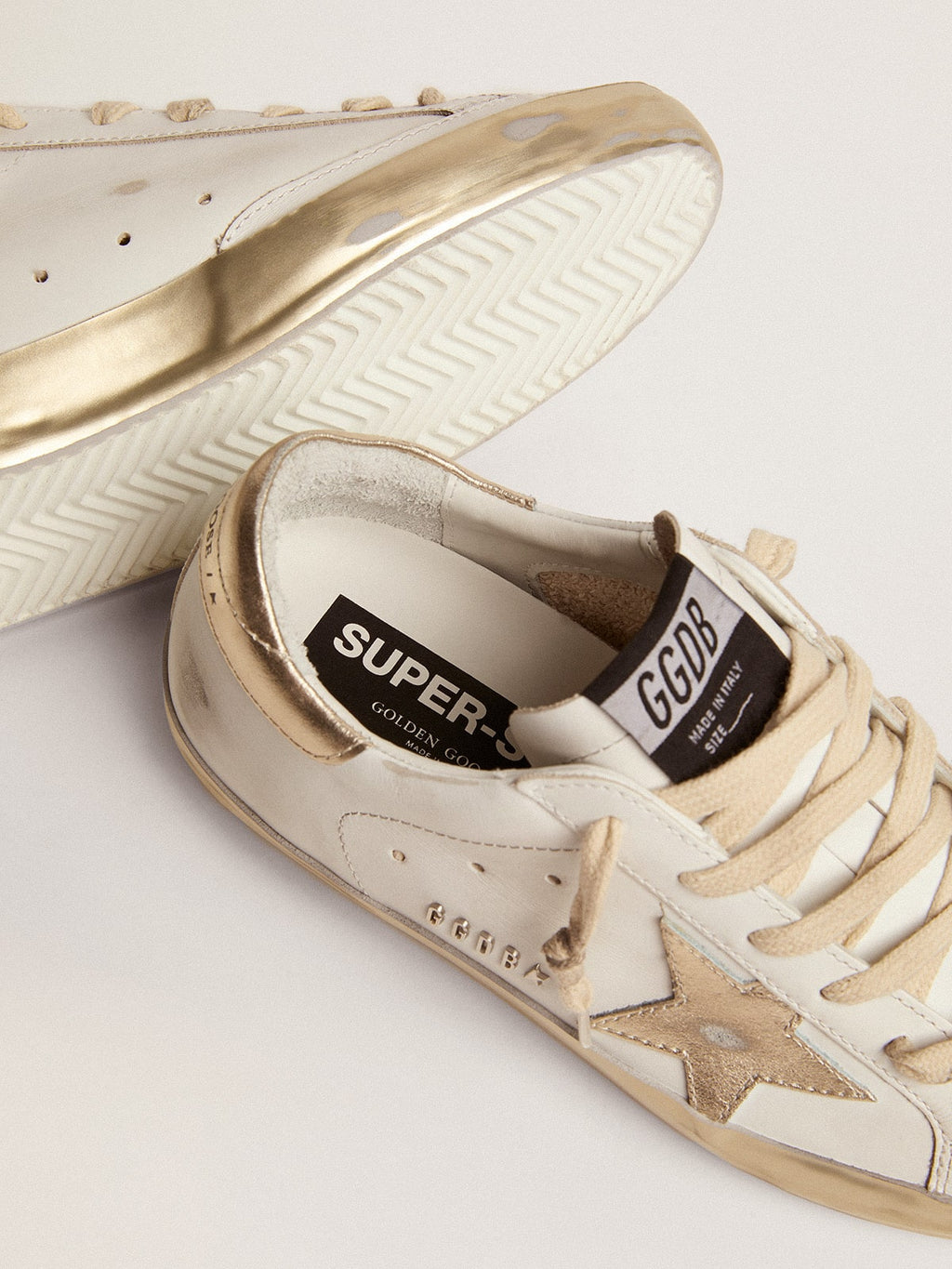 Women's Super-Star sneakers with gold foxing| Golden Goose
