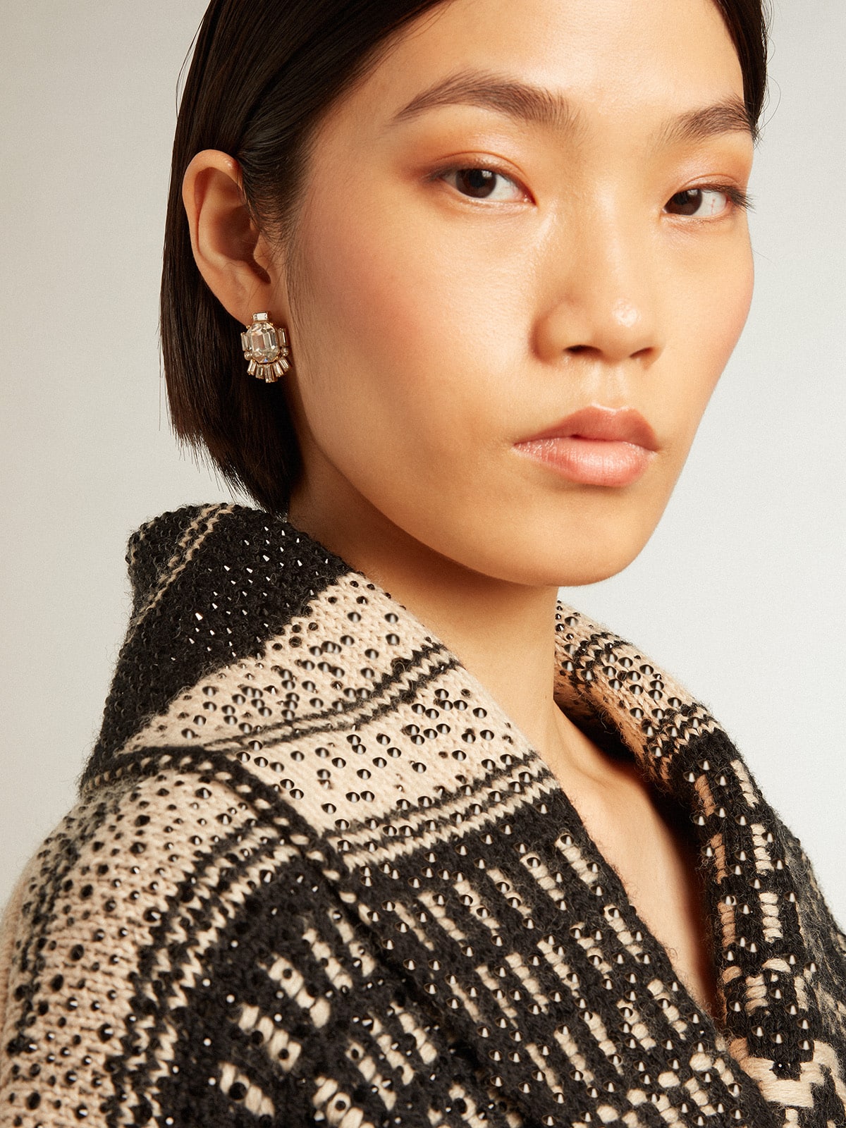 Women's cardigan in ecru wool with jacquard design and belt