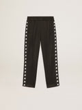 Black joggers with contrasting white stars| Golden Goose