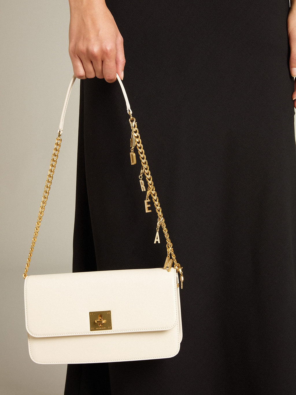 Gioia Bag in butter-colored boarded leather with gold details| Golden Goose