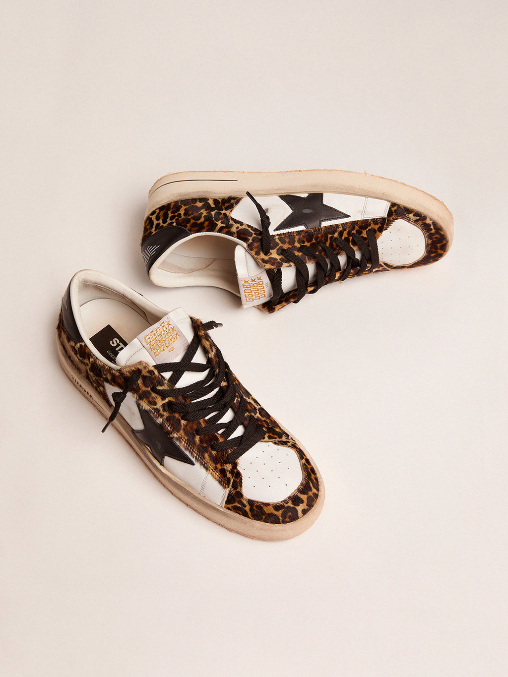 Stardan sneakers in leopard-print pony skin and black star| Golden Goose