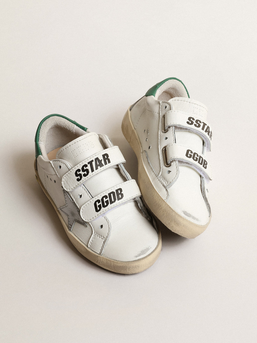 Old School Junior with metallic leather star and green heel tab| Golden Goose