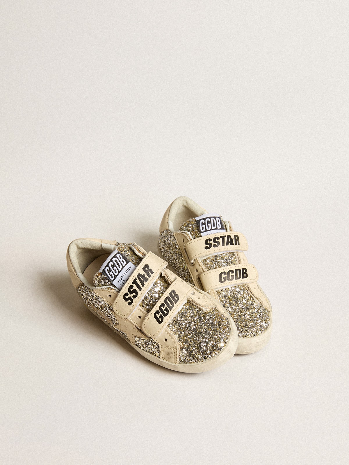 Old School Junior in platinum glitter with leather star and heel tab| Golden Goose