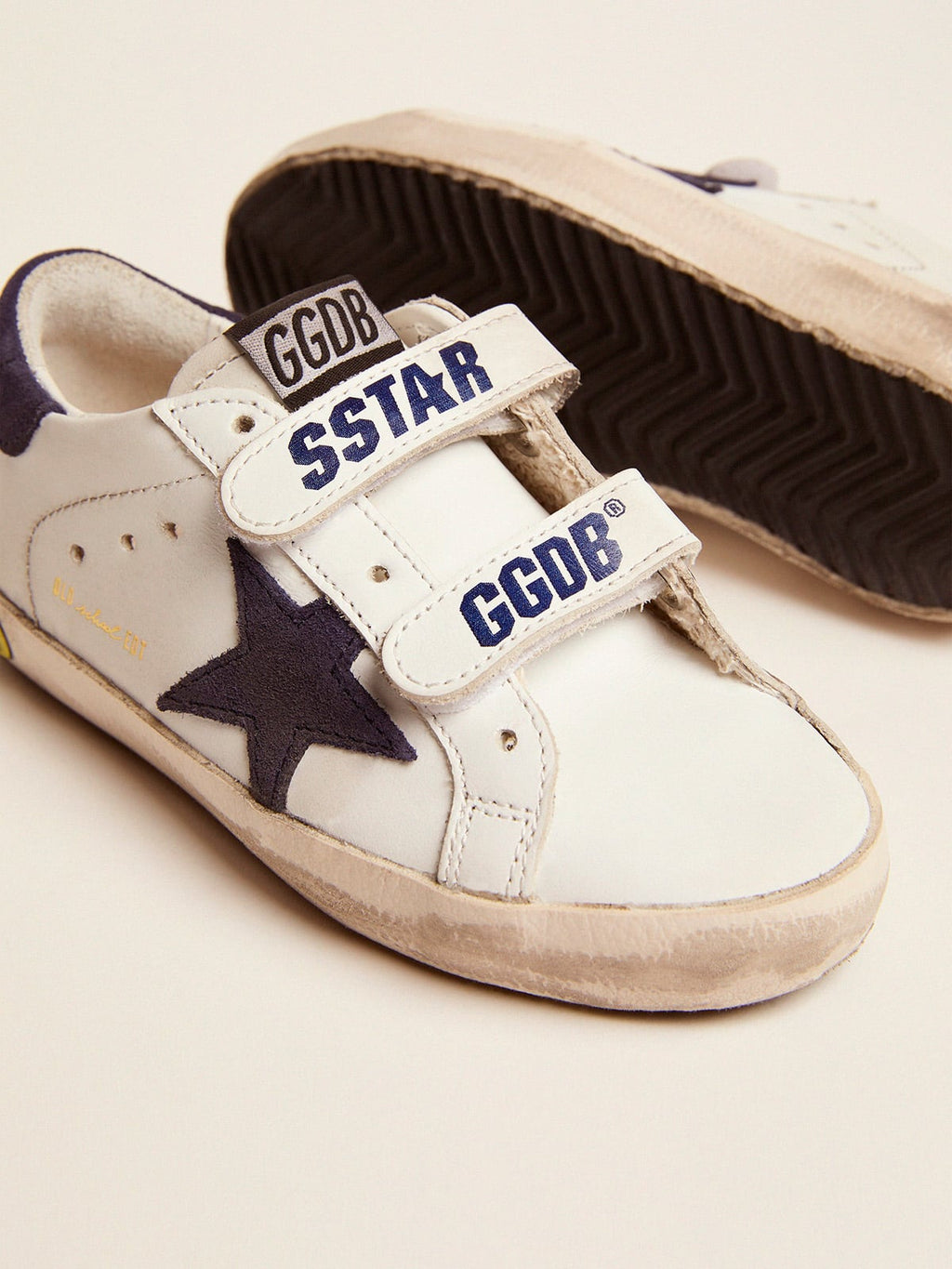 Old School Junior in white leather with blue suede star and heel tab| Golden Goose