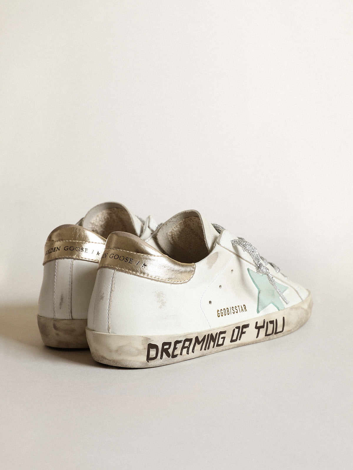 Super-Star LTD with an aquamarine star and platinum heel tab| Golden Goose