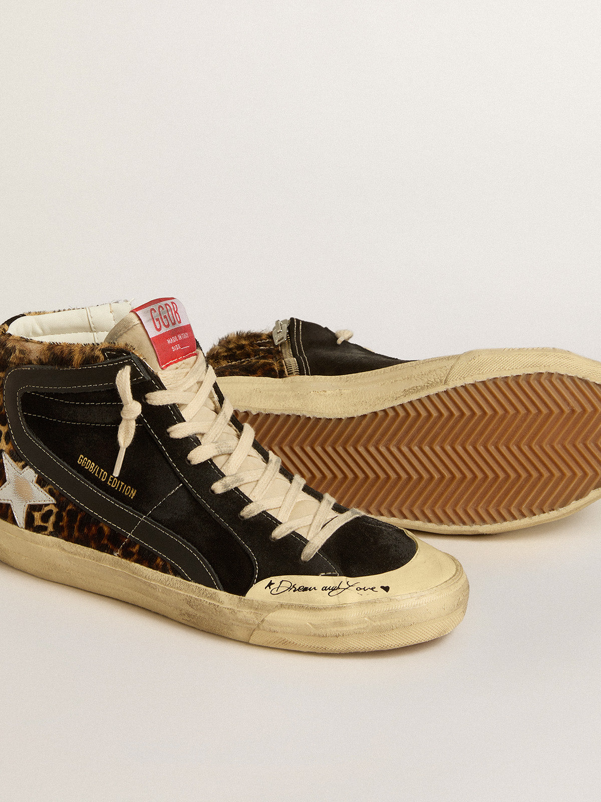 Slide Penstar LTD in leopard-print pony skin with silver star and black flash| Golden Goose
