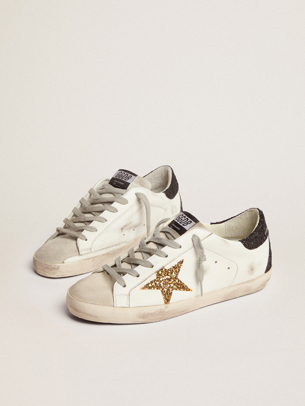 Women's Super-Star with gold star and black glitter heel tab| Golden Goose