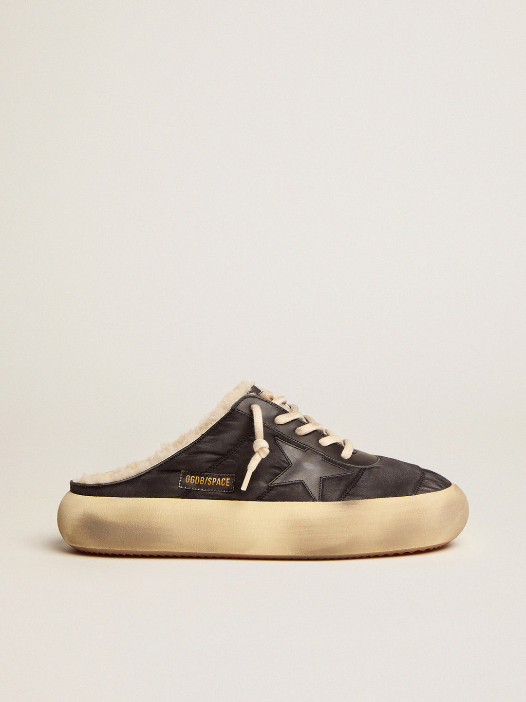 Men's Space-Star Sabot shoes in quilted black nylon with shearling lining| Golden Goose