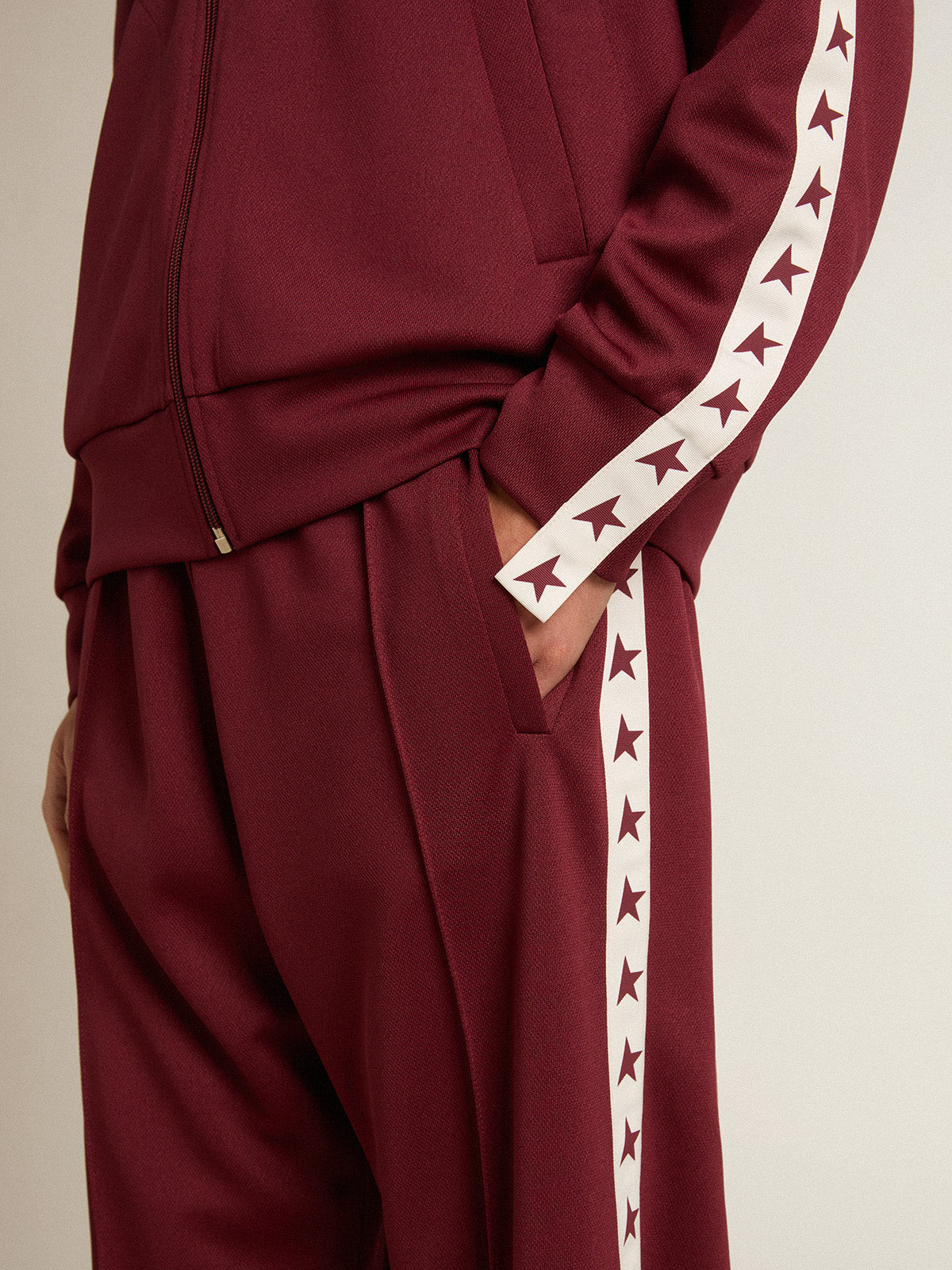 Men's burgundy zipped sweatshirt with white strip and contrasting stars| Golden Goose