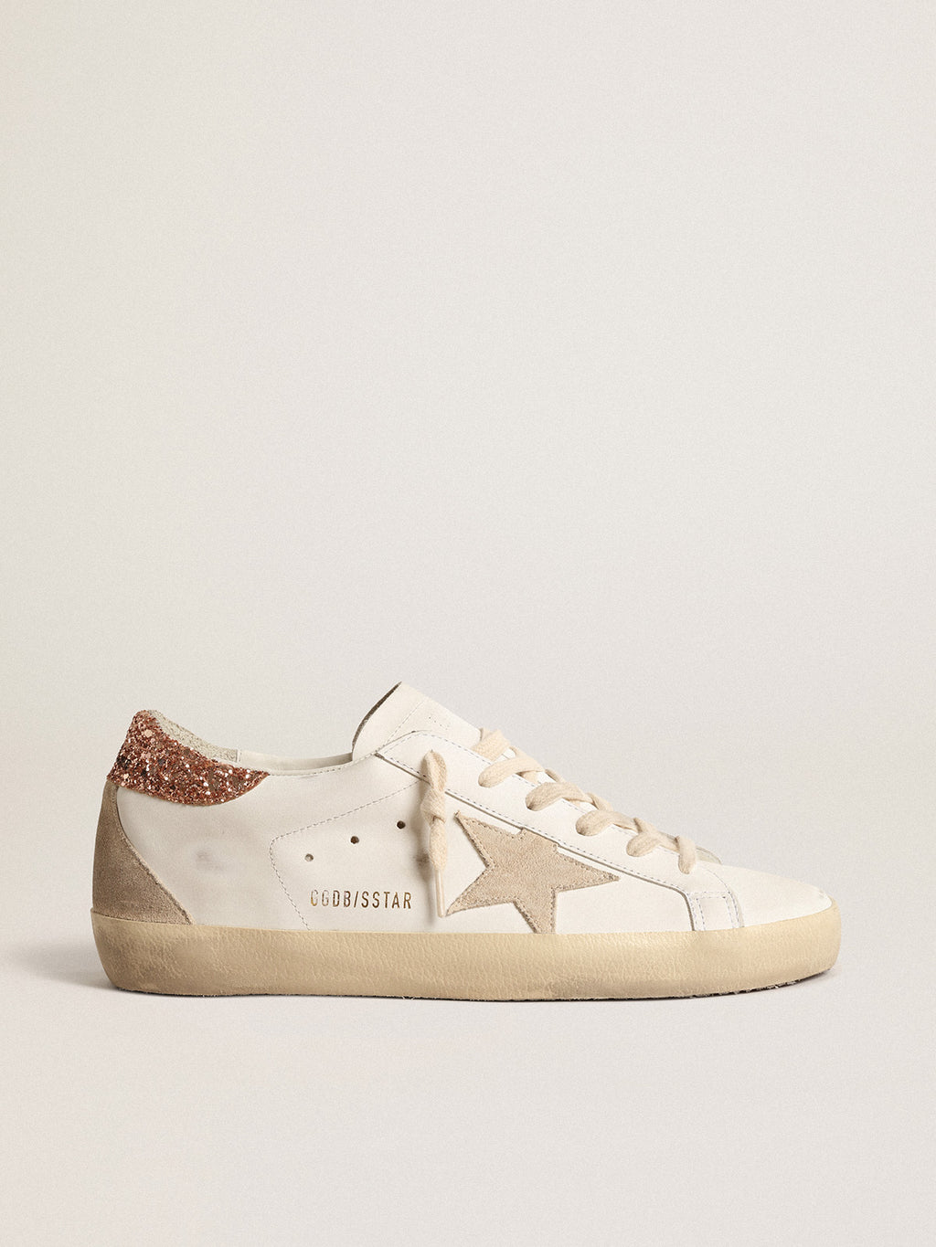 Super-Star with a suede star and peach-pink glitter heel tab| Golden Goose