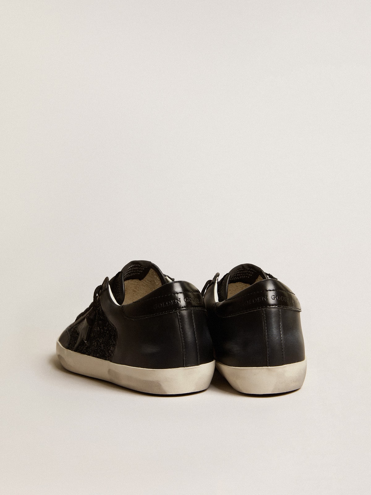 Women's Super-Star in black nappa and glitter with glossy black leather star| Golden Goose