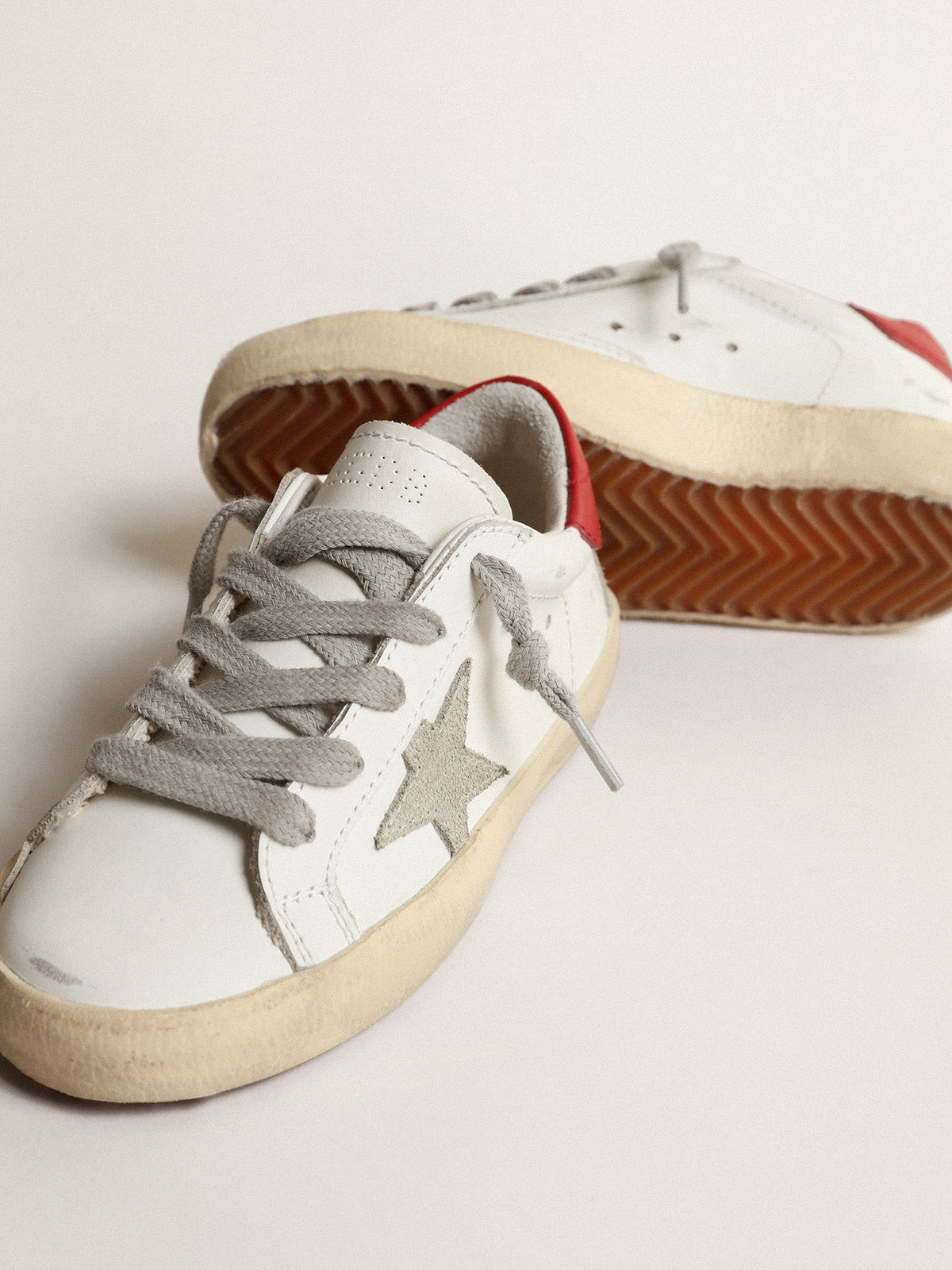 Super-Star Young with suede star and red leather heel tab| Golden Goose