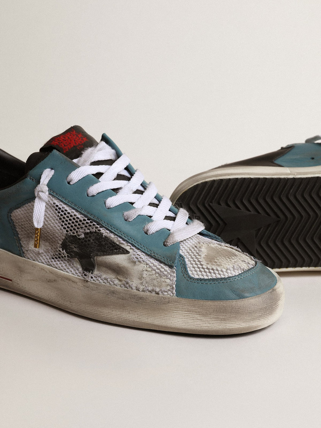 Men's Stardan in distressed mesh and petrol-colored upper| Golden Goose